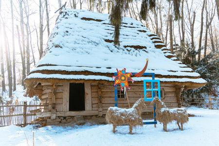 Ukrainian tradition village Christmas rural nativity scene with ethnic historical decorations near rustic living log house open air museum remarkableの写真素材