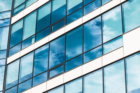 glass facade architecture modern building frame work pattern perspective smooth wall surface geometric shape external sideの写真素材
