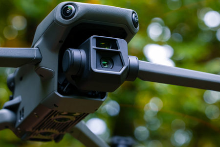 camera lens on gimbal system flying drone front side technological production wireless device for photography and videography occupationの写真素材