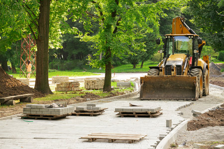 pavement building street tile construction landscaping process by tractor roller industrial vehicle...