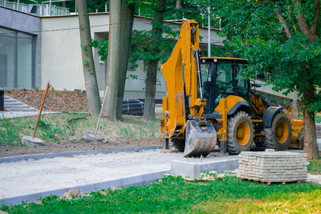 construction equipment industrial vehicle tractor bucket building and paved road track