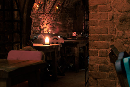 dungeon tavern fantasy bar aesthetic of role play place warm candle light interior of underground...