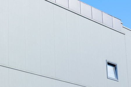 external white wall hangar building perspective facade window minimalism architecture view copy space advertising concept pictureの写真素材
