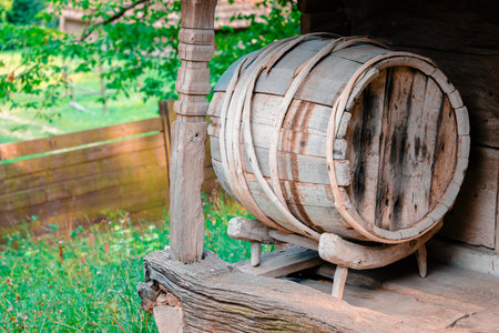 wooden barrel wine yard rural porch of cabin log house country side garden environment spaceの写真素材