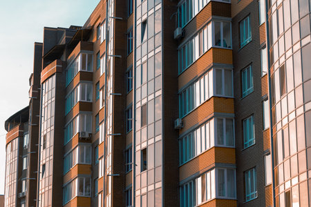 high rise living multi apartment building walls and windows exterior facade urban close up...