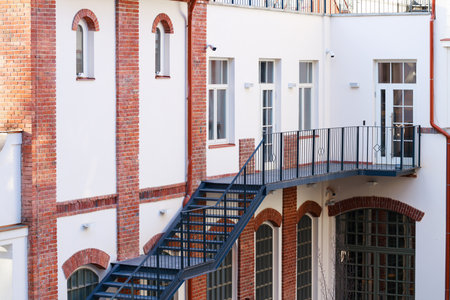 industrial building complex yard construction frame work elements with metallic balcony and stairsの写真素材