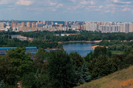 Eastern Europe capital city living district background panorama urban view with foreground park and...