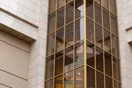 commercial skyscraper office building close up facade concrete and glass exterior material wall...