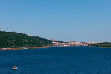 summer city scape sea bay waterfront district panorama view of buildings background, and water...