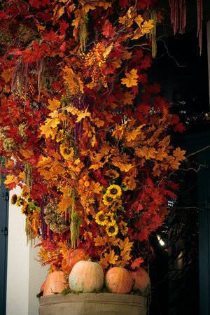 external facade decoration elements synthetic foliage orange color warm light with pumpkins vertical...