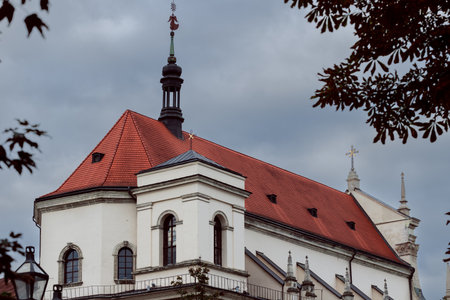 overcast landmark church in small Europe city moody aesthetic atmosphere architecture of religion buildingの写真素材