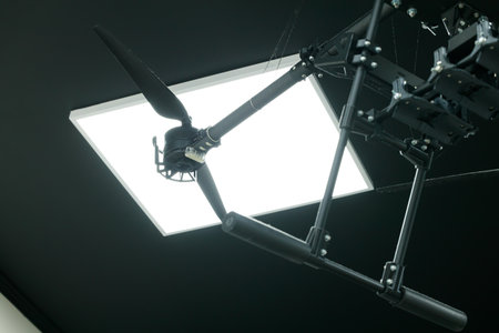 technology drone heavy bomber carbon chassis wing and propellers elements of frame in work shop...
