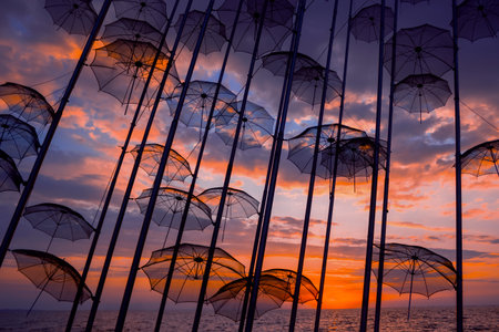 dusk atmosphere sunset evening sea scape coast line with landscaped decorative umbrellas heritage side background concept viewの写真素材