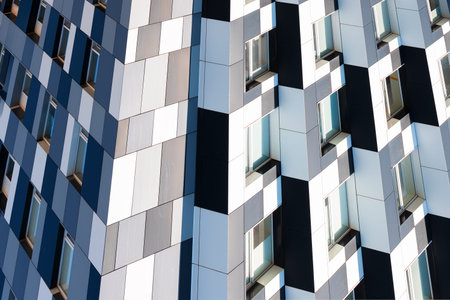 An abstract architectural detail showcases a contemporary building's exterior featuring a striking...