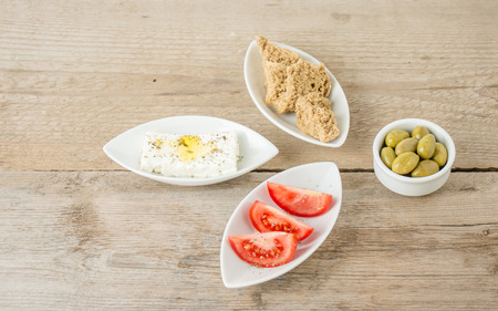 Greek Appetizers feta, tomatoes and rusks. Mediterranean traditional healthy food.の写真素材