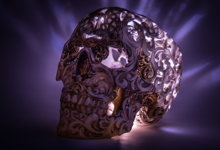 Skull with carved pattern adn light inside.の写真素材