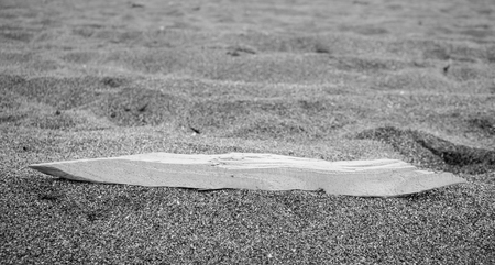 Wooden Direction indicator on sand.の写真素材