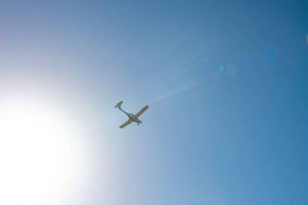 Airplane fly in a blue sky. Copy space for text.の写真素材