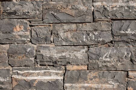 Texture of a stone. Old stone wall texture background. Grey stone wall as a background or texture....
