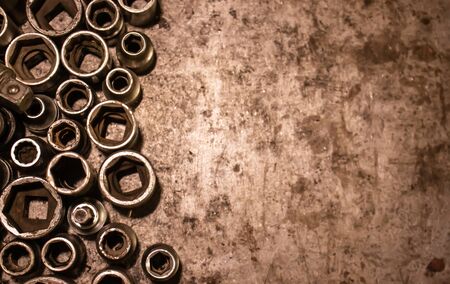 Mechanic tools set on metal background. Vintage style image of blank space on metal, lot of old tools. Copy space. Car service and repair concept. Tools on working table.の写真素材