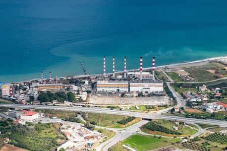 Electricity power plant on sea background. ELECTRICITY FACTORY HERAKLION CRETE, GREECE.の写真素材