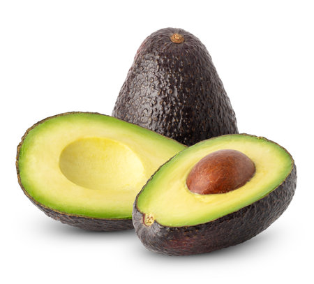 Isolated avocado. Whole avocado fruit and cut with half isolated on white backgroundの写真素材