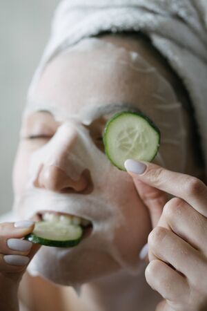 Cosmetic moisturizing procedure. Woman rests and cares about skin health.の写真素材