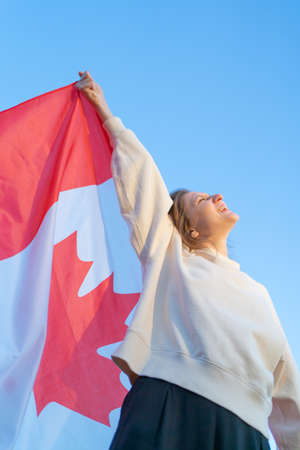 The happy Canadian celebrates and rejoices in success and victory.の写真素材
