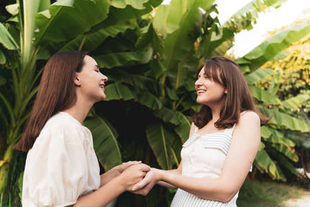 Womens friendship. Meeting the sisters in a pandemic. Friends hugの写真素材