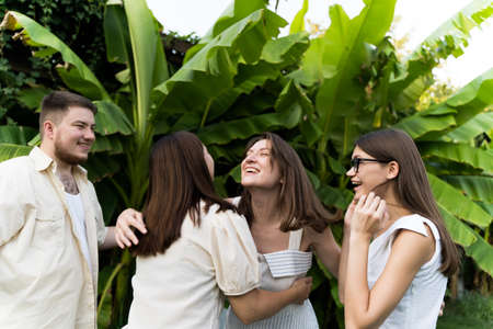 Friends hug at a meeting. Family, brother and sisters. Happy emotion togethernessの写真素材