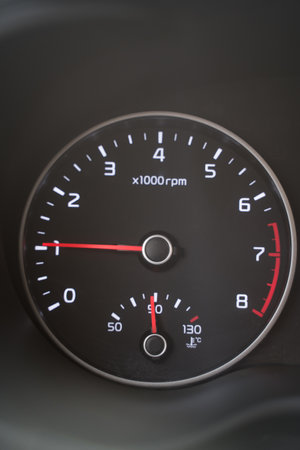 Close-up of the car tachometer. Auto starts. Control of indicators on the scoreboard. Indicators and arrows in the panelの写真素材