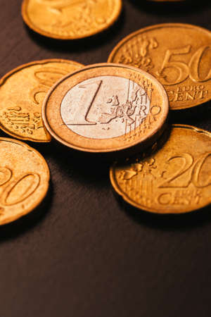 european coins on wooden and blurred backgroundの写真素材