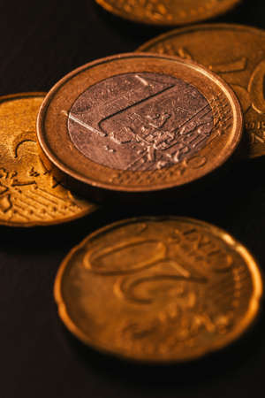 european coins on wooden and blurred backgroundの写真素材