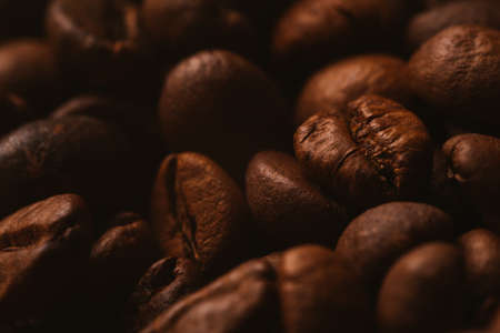 Roasted coffee beans, can be used  as a background.  Coffee beans texture macro