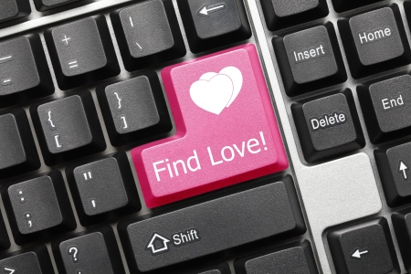 Close up view on conceptual keyboard - Find Love  pink key の写真素材