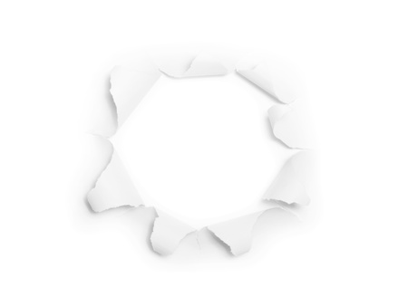 The sheet of torn paper with round hole isolated on white backgroundの写真素材