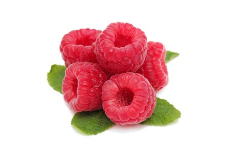 Ripe raspberry with green leaves isolated on white background