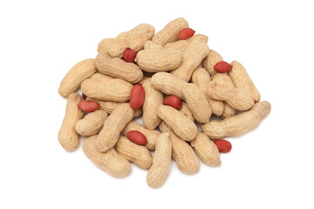 Stack of groundnuts isolated on white background
