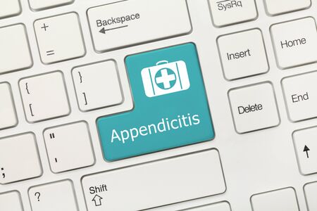 Close-up view on white conceptual keyboard - Appendicitis (blue key)の写真素材