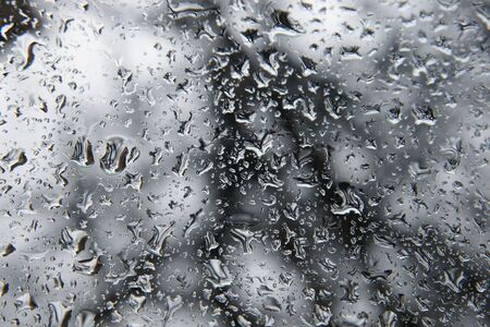 water drops on window glassの写真素材