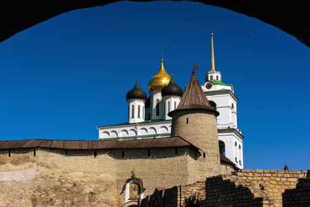Walk along walls of the Pskov Kremlin in summer sunny dayの写真素材