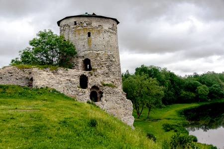 Gremyachaya Tower in Pskov in the summer in cloudy dayの写真素材