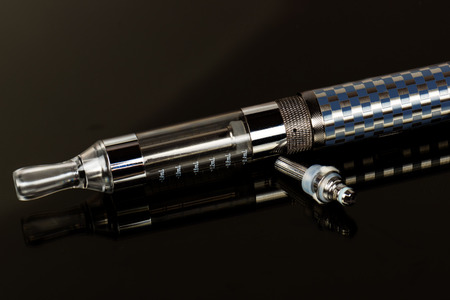 Electronic cigarette (vape) in the sorted look against a dark background.