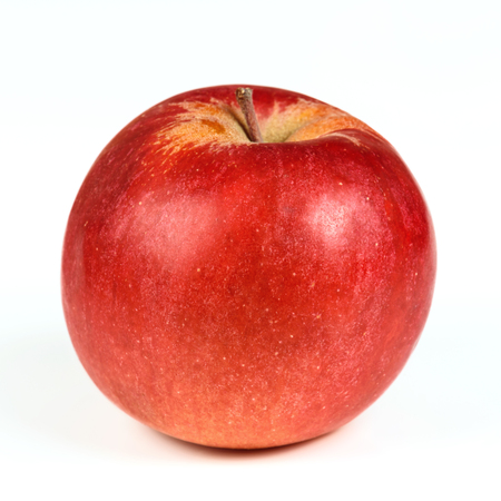 One red ripe apple close up on a white background.の写真素材