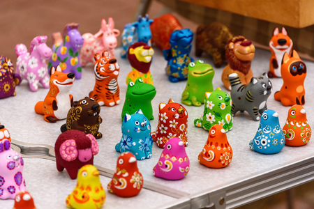 Clay souvenir musical toys are sold on a street tray in Vitebsk. Belarus, June 2017.のeditorial素材