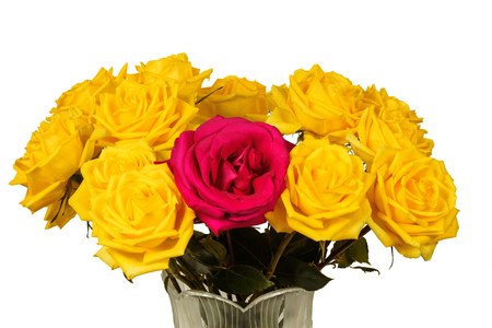 Bouquet of yellow roses in a vase isolated against a white backgroundの写真素材