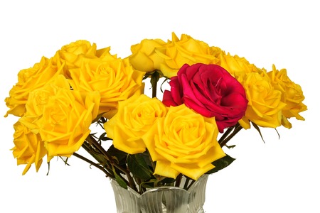 Bouquet of yellow roses in a vase isolated against a white backgroundの写真素材