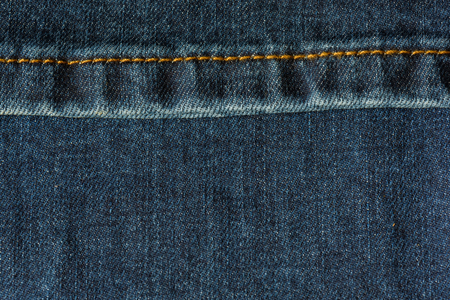 Denim jeans texture background. Texture of blue cotton fabric. Fabric structure.の写真素材