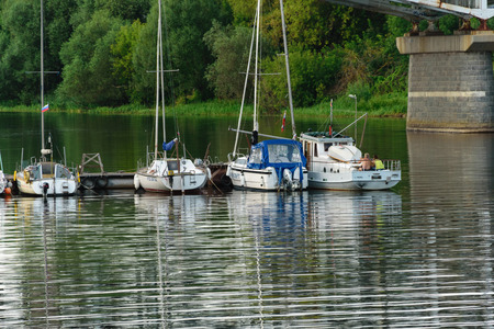 Russia, Tver region, August 2018. Pier for small ships at the bridge in Tver.のeditorial素材