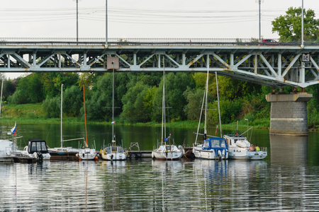Russia, Tver region, August 2018. Pier for small ships at the bridge in Tver.のeditorial素材